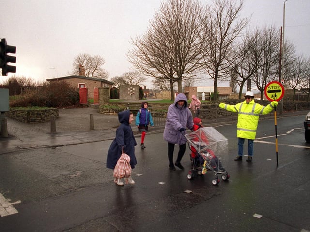 Lollipop lady Carol Archibald patrols the pelican crossing outside Westfield Primary School in February 1997.