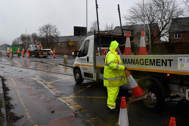 Workers had to battle the elements on Monday as the roadworks began