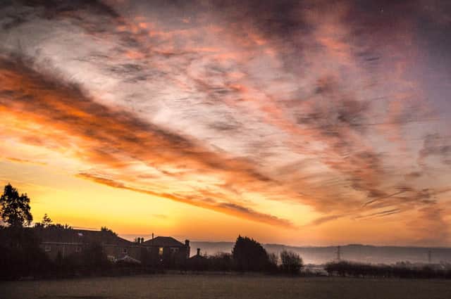 Sunrise over Norristhorpe, by Andrew Duffield