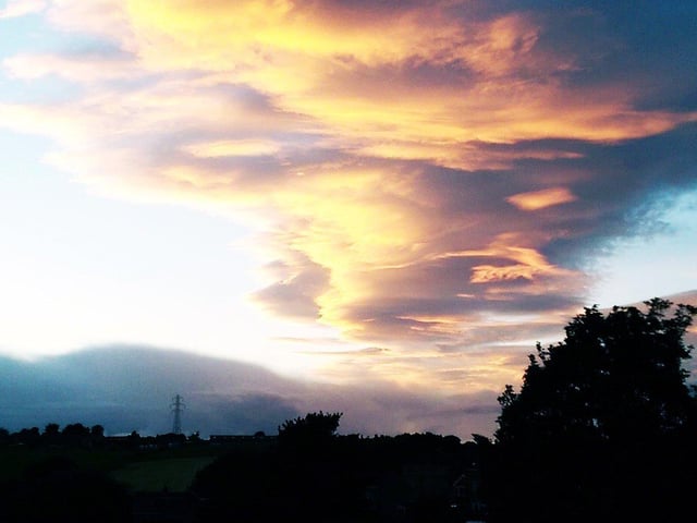 Late evening sky over Birkenshaw, by John Kellett