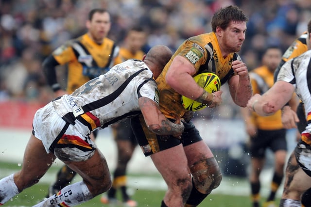 Castleford Tigers' second game in the 2012 Super League season was featured heavily along with a preview of the next match against Catalans Dragons. Here Jake Emmitt takes on the Bulls defence.