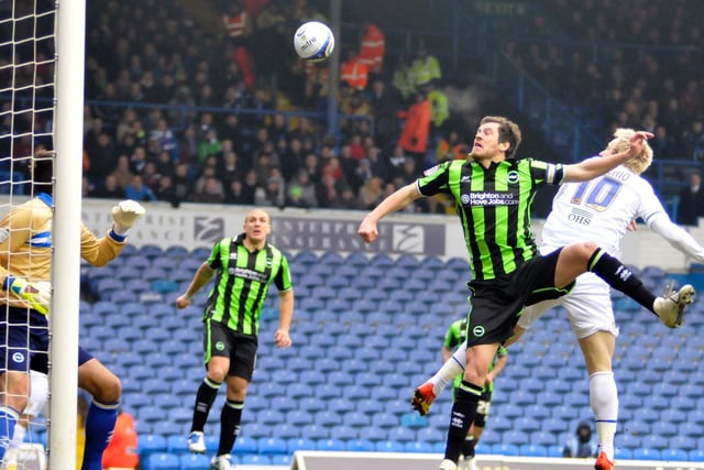 Luciano Becchio heads in a goal for Leeds United against Brighton, but it was not enough for the Whites as they lost 2-1 to fall out of the Championship play-offs picture.