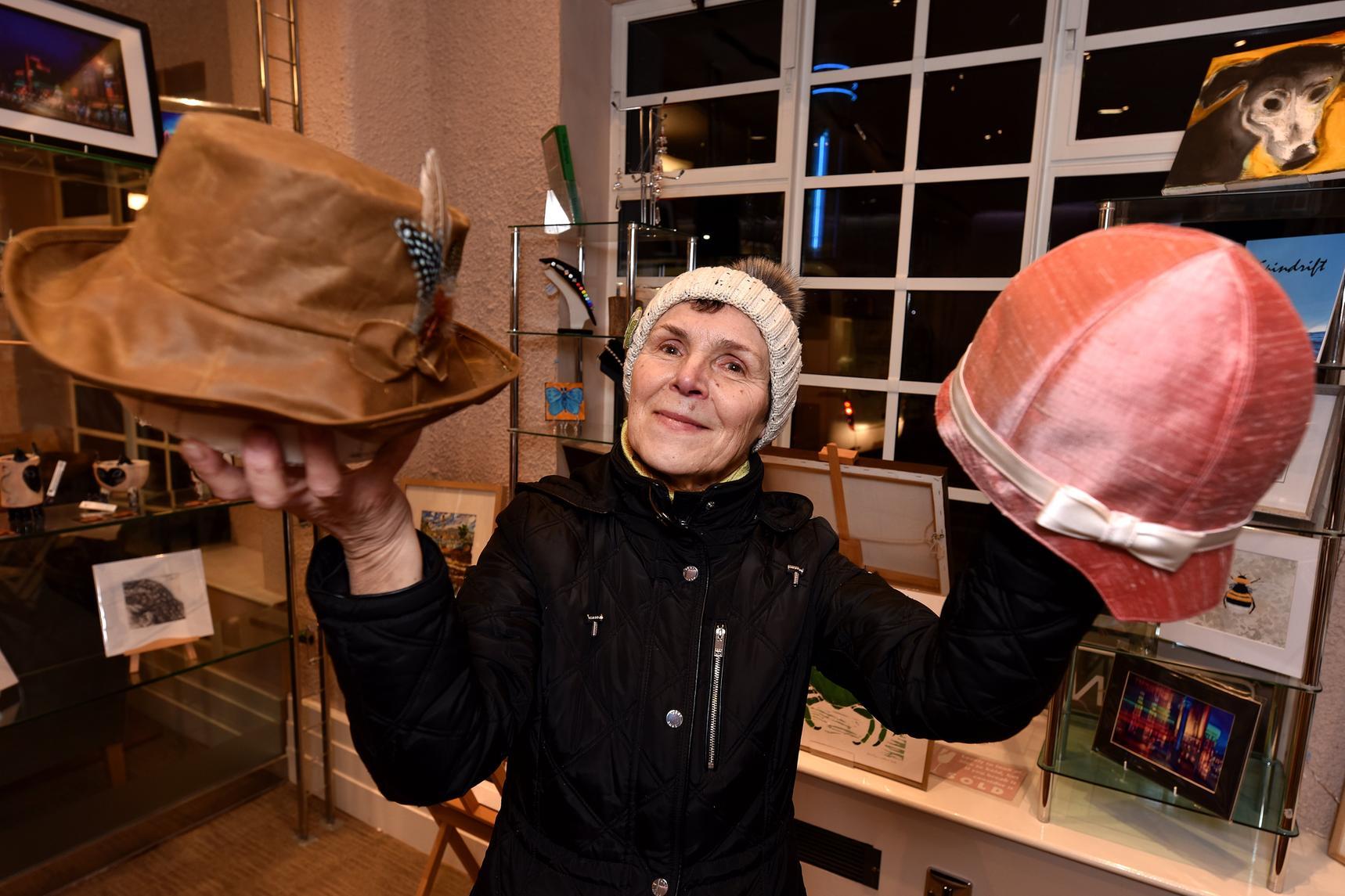 Elena Tradewell makes hats and is one of scores of crafers and artists who use the shop in the theatre foyer to showcase their work