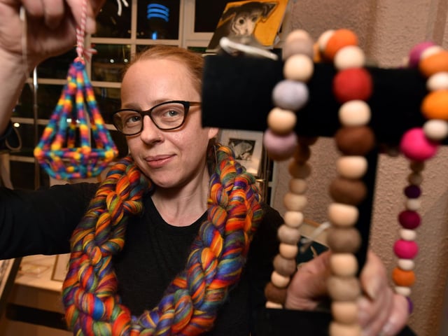 Textile specialist Charlotte Hill makes jewellery, scarves and clothes, She also has a shop in the Market Vaults.