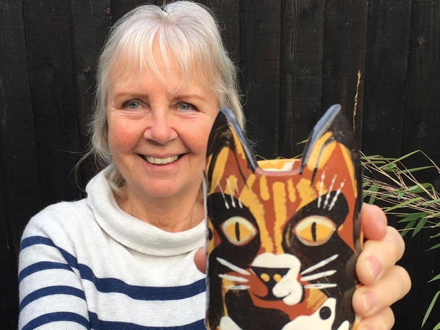 Helen Ventress returned to Scarborough six years ago, having left Troutsdale aged 12.
She taught in further education and spent the past 20 years of her career as head of art and design at Harrogate College and York College.
She works with a group of potters based at the St James Arts Centre Ceramic Studio and uses brightly-coloured clay to decorate vessels of all kinds.
Her pots are hand-built or thrown. Her cats came to the theatre just before Christmas.