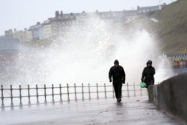 Whitby residents walk on through the wind and the rain as Storm Dudley ruffles feathers up and down the country.