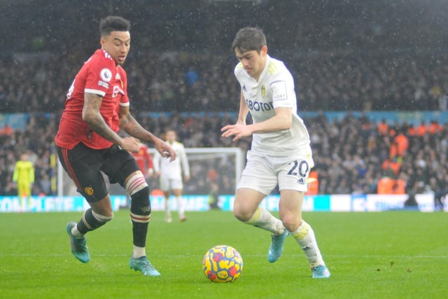 Dan James takes on his former teammate Jesse Lingard on his way to providing a cross for the second goal for Leeds United.