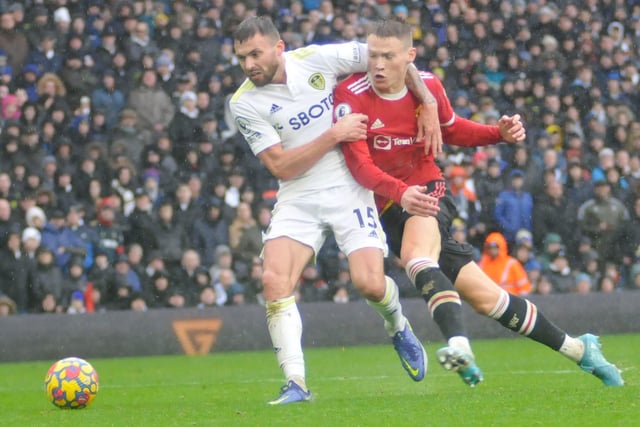 Stuart Dallas tussles for the ball.
