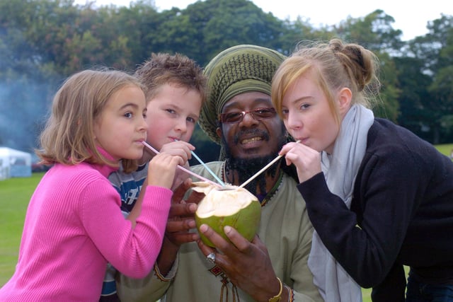 Leeds West Indian Carnival, pictured youngsters (left to right) Molly Smith, aged 7, Andrew Flynn, 7, and megan Smith, aged 12, enjoying a Jelly coconut served by Ras Paul (Date: 30 August 2010).