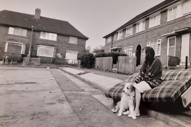 One woman and her dog sit on Amberton Garth in January 1992. Later that year houses would have been upgraded after being branded the street where no-one wanted to live.