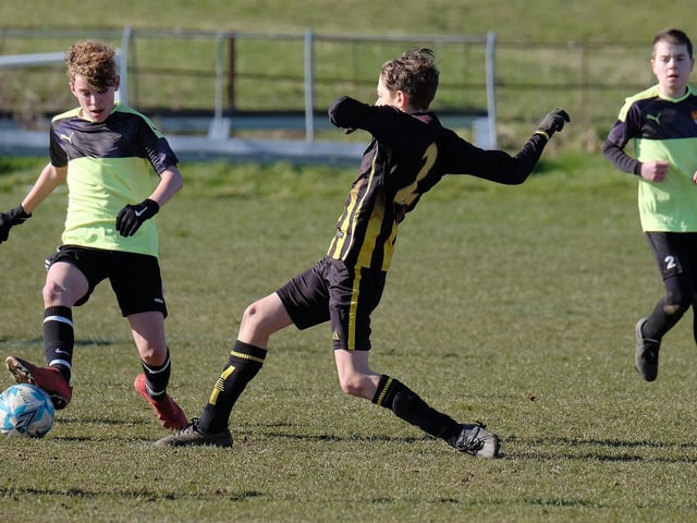 Scalby try to nick the ball away from the visitors