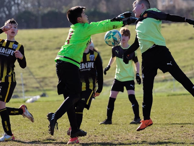 The Scalby Under-13s keeper looks to claim the ball