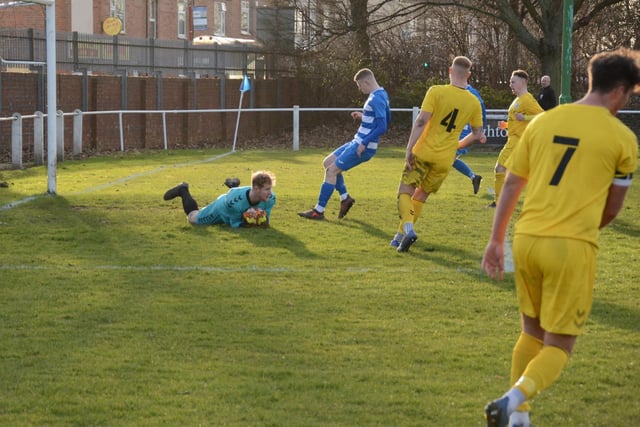 Hallam goalkeeper Myles Wright gathers the ball to deny Glasshoughton Welfare. Picture: Rob Hare