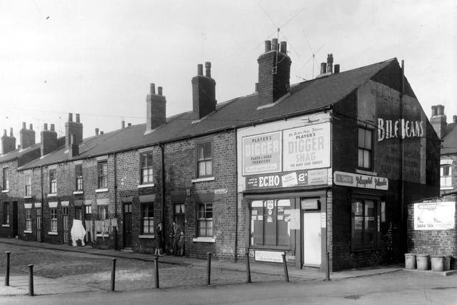 Back-to-back terraced houses on Admiral Street in Hunslet in March 1959. On the corner with Moor Crescent is Hilda Smiths grocery.