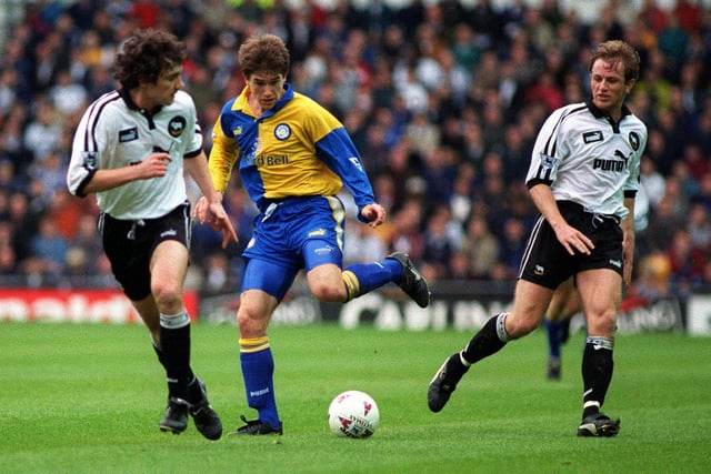Harry Kewell dances between Derby County's Christian Dailly (left) and Gary Rowett.