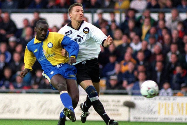 And its five! Jimmy Floyd Hasselbaink out paces Derby County's Jacob Laursen to score.