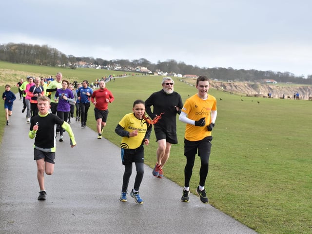 Bridlington Road Runners' Ben Edwards, right, in action at the parkrun