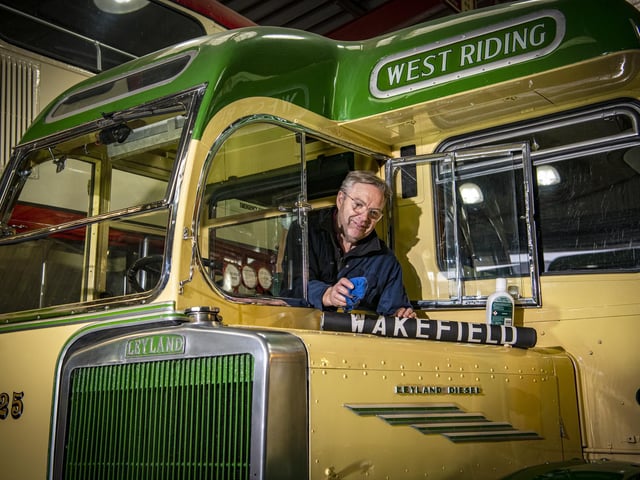 Mark Byard polishes his 1952 Leyland Tiger PS2 single deck bus