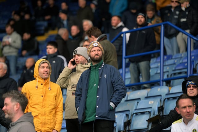 Fans wrap up warm for the game.