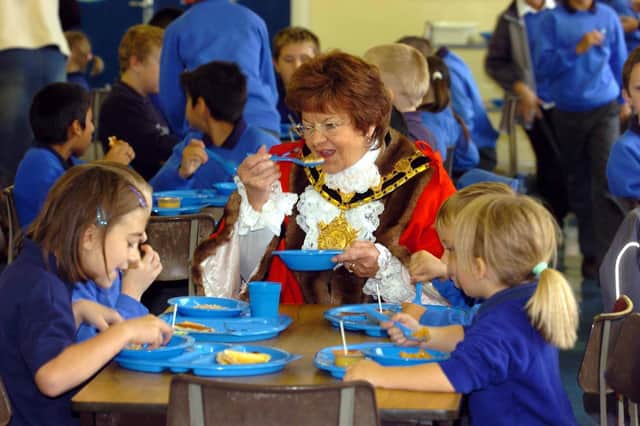 Lord Mayor of Wakefield Councillor Janet Holmes enjoys her breakfast with children at Lawefield Junior and Infant School in Wakefield.