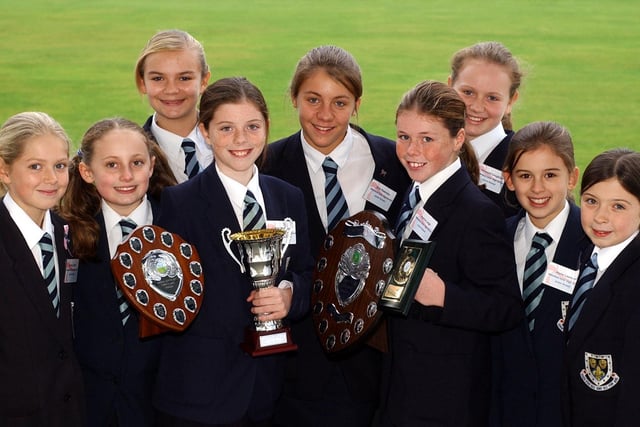 Wakefield Girls School hockey team with their trophies. Pictured from back left Hettie Barker, Ellie Rawnsley and Vanessa Coughlan all aged 12. Front left Emma Corbett, Lucy Chaplin, Laura MacGregor (captain), Joanna Leigh, Jayne Lawson and Katie Bacon all aged 11.