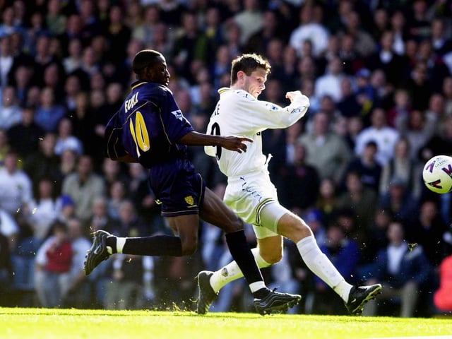 Eirik Bakke equalises for Leeds United as Wimbledon's Jason Euell closes in.