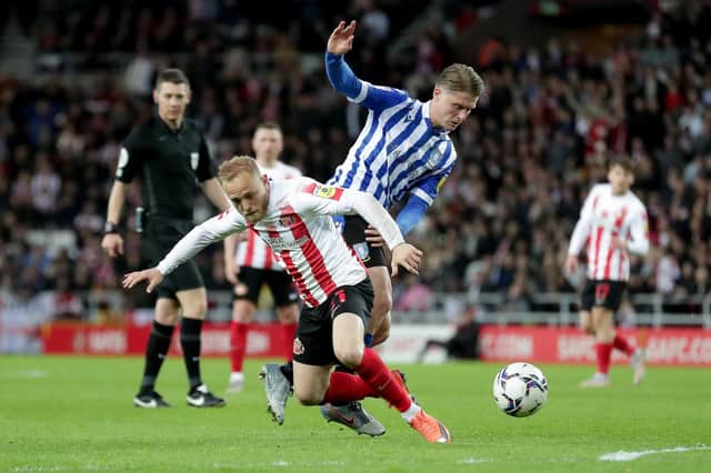 <p>Sunderland's Alex Pritchard and Sheffield Wednesday's George Byers battle for the ball. Picture: PA</p>