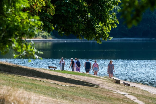 Members of the public out enjoying the warm weather in Roundhay Park, Leeds