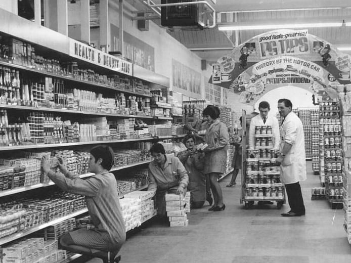 Staff stock the shelves at the Lion Store on Providence Street, Wakefield, in November 1968