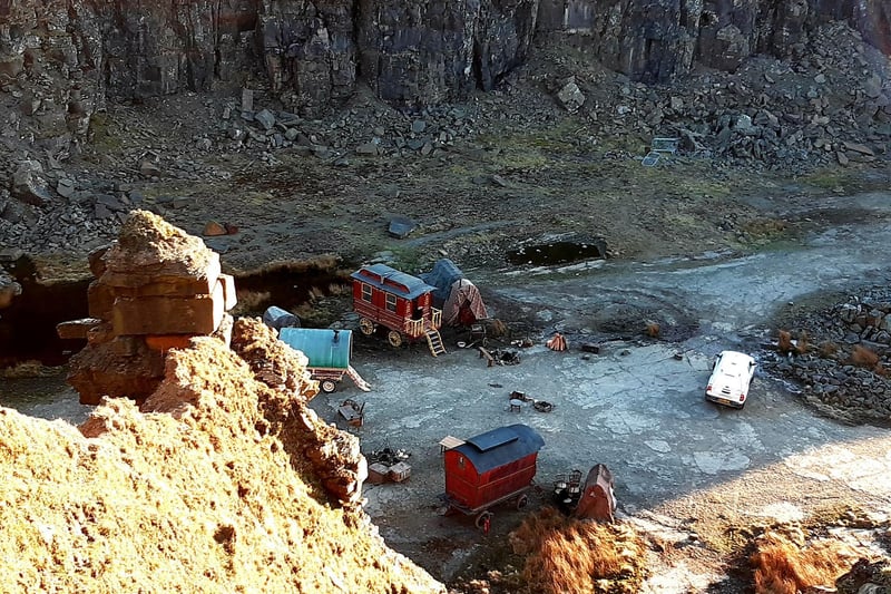 Looking down on the caravans at the bottom of the quarry