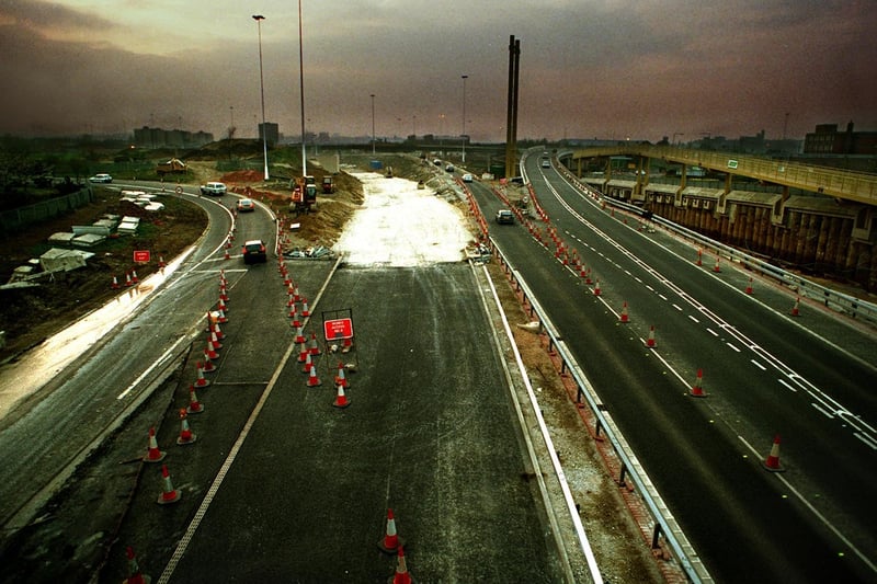 All roads lead to the city as dusk falls over Leeds and traffic follow cones left by workmen at the end of the M1.