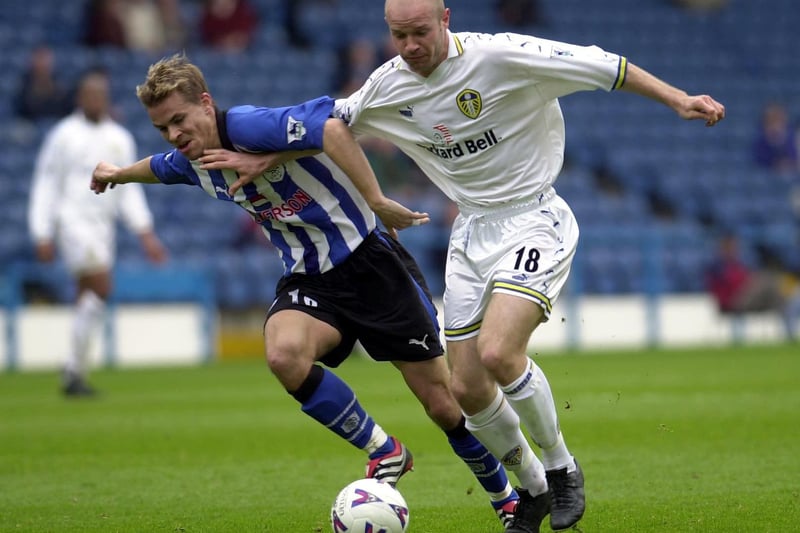 Danny Mills wins the battle for the ball.