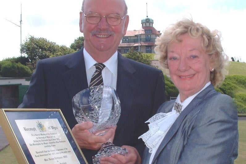 Proud day when Mrs Lofthouse, pictured with husband Tony, received the Freeman of the Borough scroll and a crystal vase presented to her at a ceremony in 2003