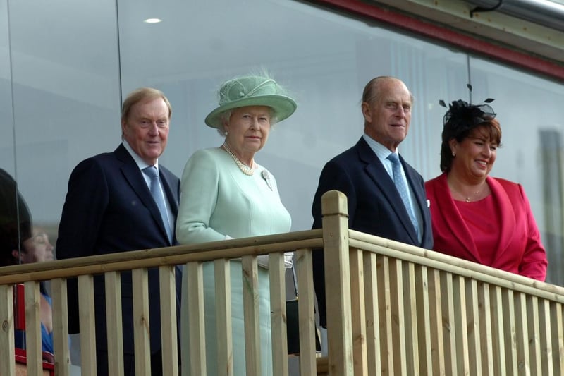 Prince Philip with the Queen and former Burnley Football Club chairman Barry Kilby at Turf Moor in 2012