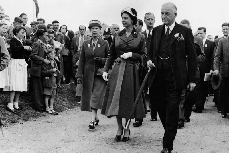 The Queen accompanied by Sir John Dunnington-Jefferson, and followed by the Princess Royal and the Duke of Edinburgh tours the Great Yorkshire Showground at Harrogate.