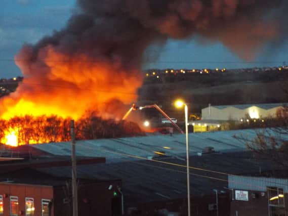 West Yorkshire Fire and Rescue Service have sent eight crews to the scene and are urging residents to keep windows and doors shut. People are also advised to avoid travelling through the area.