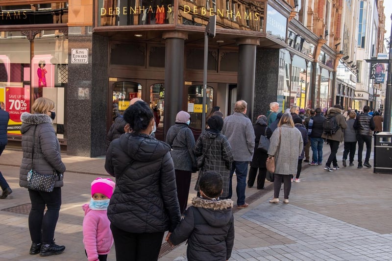 The queue for Debenhams in Leeds as non essential shops and services re-open following easing of Covid lockdown measures (photo: Bruce Rollinson).