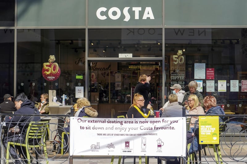 With outdoor dining now allowed, crowds gathered outside coffee shops to enjoy a drink in the sunshine, including the Costa in Trinity Walk.
