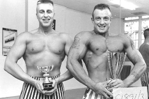 Two Pontefract weightlifters with their trophies, pictured between 1980-1990