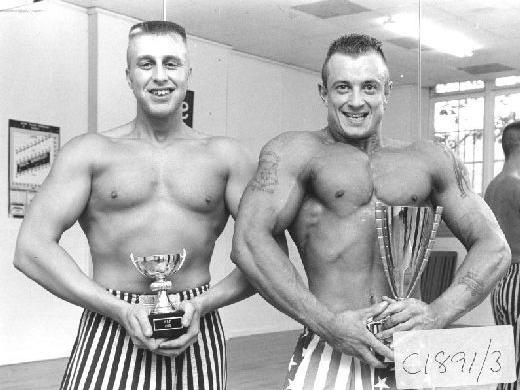 Two Pontefract weightlifters with their trophies, pictured between 1980-1990