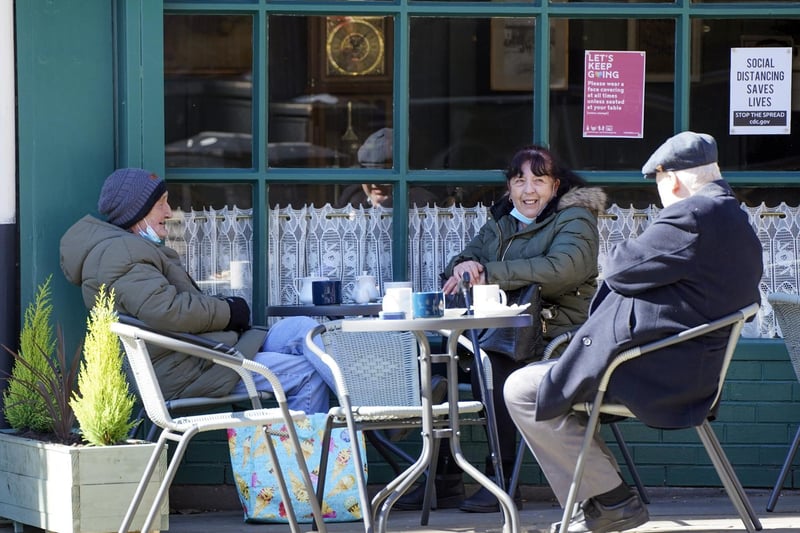 But an easing of restrictions means that people are now allowed to enjoy food and drinks outside with people from one other household - putting catch ups firmly back on the agenda. Here, friends look thrilled as they enjoy coffees in Pontefract on Monday.