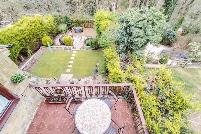 The family home benefits from a large rear garden, with a paved terrace from the back of the house leading to a generous lawn with mature borders and hedges.