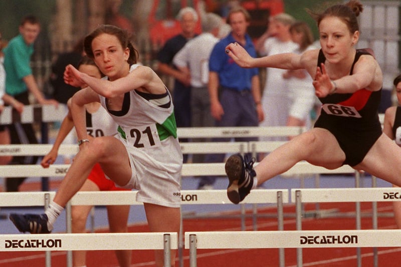 Wigan Harriers, Adele Oliver, right, and Leigh Harriers, R. Hampson,  compete in the U15 Girls 75 metres hurdles  in the Greater Manchester 6th Annual Track and Field Championships at Robin Park in 1998.