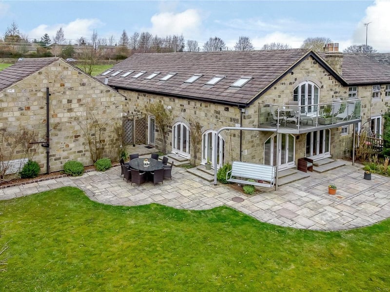 Hazel Forge in Wike Ridge Lane is a unique family home which has been built by the current owners. It has two reception rooms, three bedrooms all with en-suite and a separate annex with three bedrooms. It is on the market for £1,600,000 with Strutt & Parker.