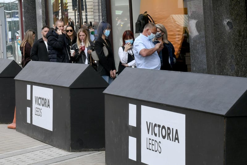 Shoppers queue to get into Victoria Leeds