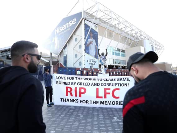 Banners outside the stadium against Liverpool's decision to be included amongst the clubs attempting to form a new European Super League.