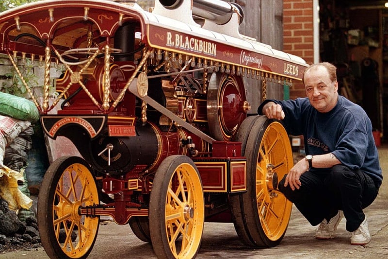 This is Randy Blackburn pictured at his home in Leeds with his ten year creation -  a scale model of a Fairground Engine.