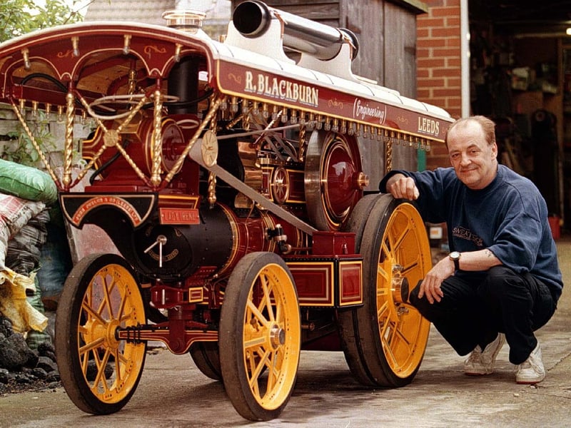 This is Randy Blackburn pictured at his home in Leeds with his ten year creation - a scale model of a Fairground Engine.