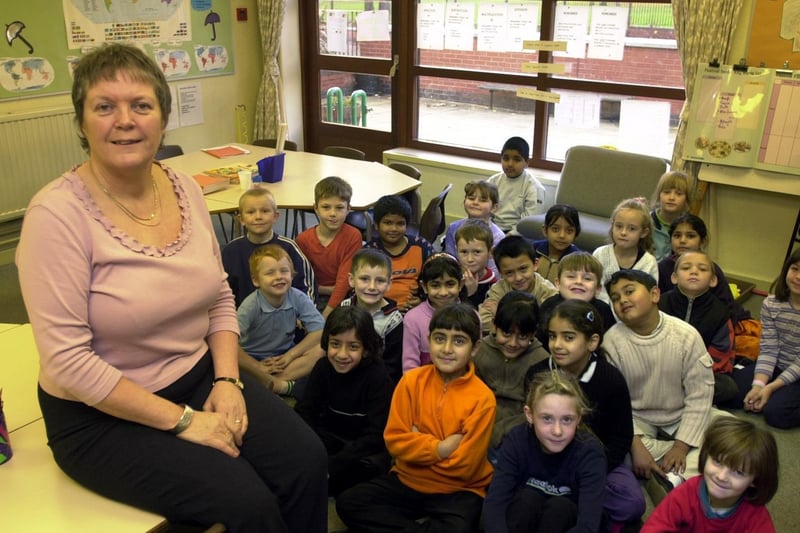 Head teacher Ann Philips with pupils at Cross Flatts Park Primary which in December 2001 was the most improved school in Leeds.