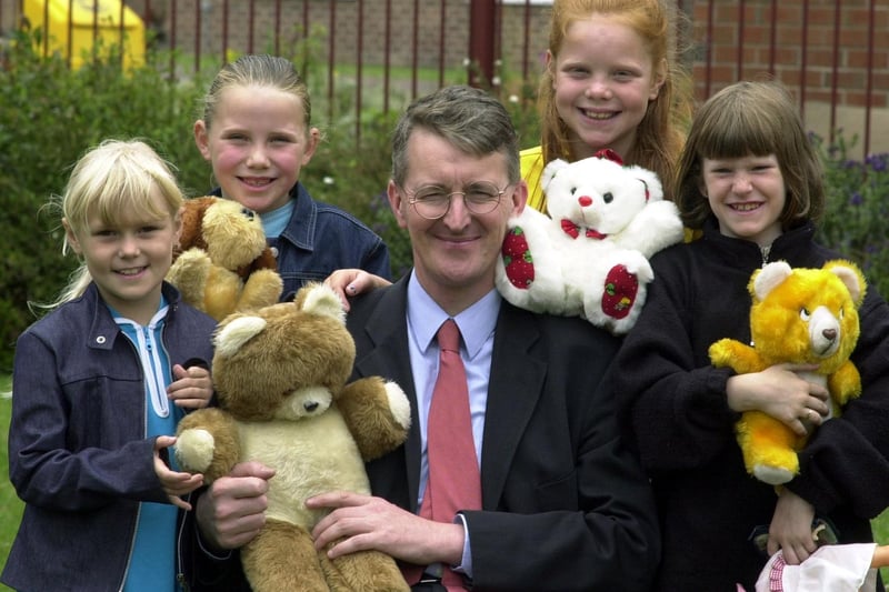 MP Hilary Benn opened the Cardinal Court summer fair at Beeston in July 2001. He is pictured with  local children Livinia Hill, Rebecca Smith, Sophie Smith and Kimberley Reeves.